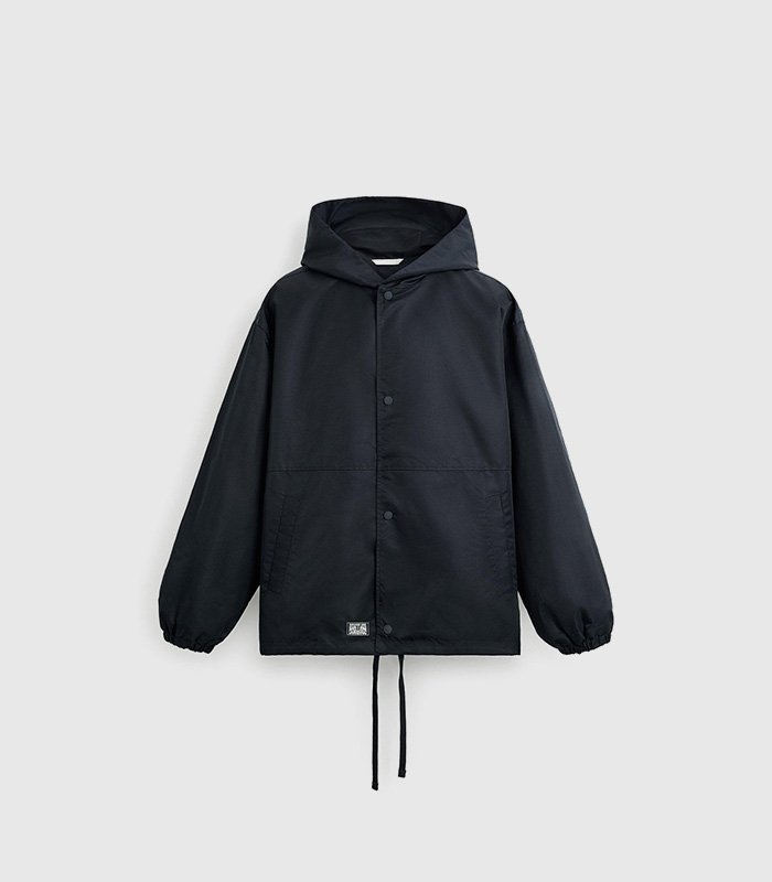 Hooded technical jacket